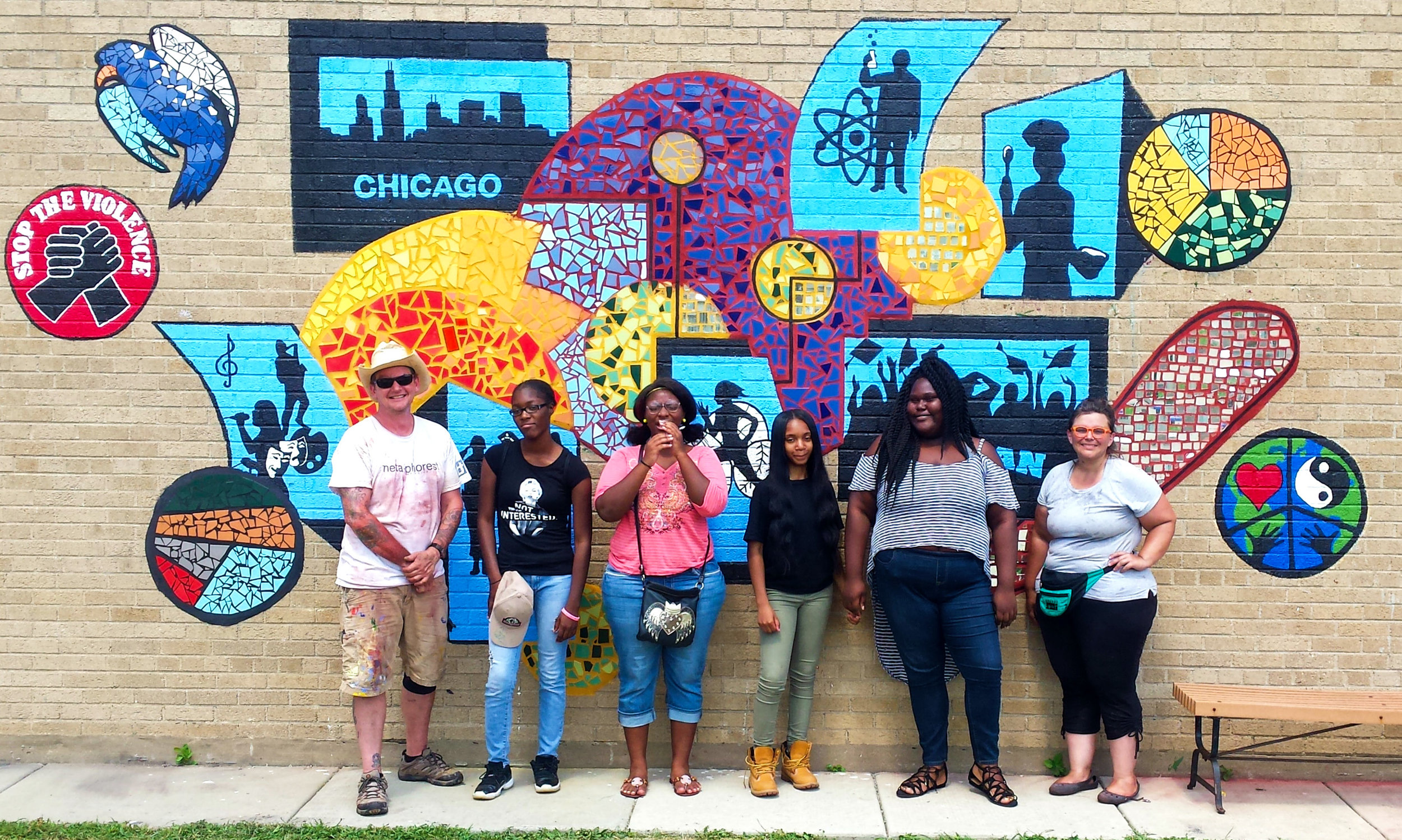 Harlan Mural/ Windows to the Future 8-1/2017 Artists: Amanda Mudrovich and Todd Osborne Location: Harlan Community Accademy/ 9652 S. Michigan Ave. Chicago Public Art Group collaborated with Metropolitan Family Services and Harlan Academy High School to create a bricolage on a wall in the courtyard of the school. CPAG was granted the Safe and Peaceful grant through Chicago Community Trust to partially fund this project.